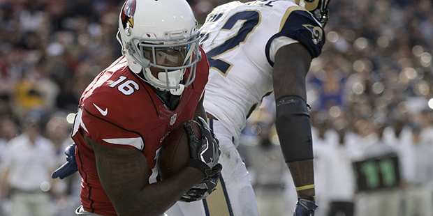 Arizona Cardinals wide receiver Jeremy Ross (16) scores past Los Angeles Rams middle linebacker Ale...
