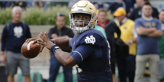 Notre Dame quarterback DeShone Kizer throws during the first half of an NCAA college football game ...