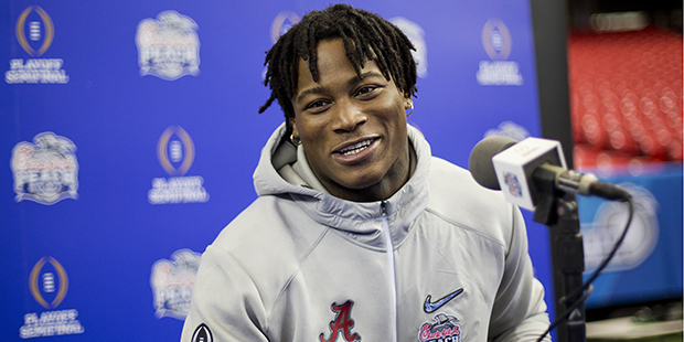 Alabama's Reuben Foster answers a question during media day for Saturday's Peach Bowl NCAA college ...