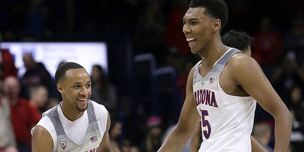 Arizona's Parker Jackson-Cartwright (0) and Allonzo Trier celebrate after Arizona defeated Southern...
