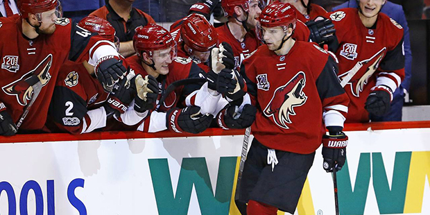 Arizona Coyotes right wing Radim Vrbata, front right, celebrates his game-winning goal against the ...