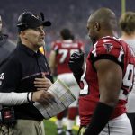 Atlanta Falcons head coach Dan Quinn talks to Dwight Freeney during the second half of the NFL Super Bowl 51 football game against the New England Patriots Sunday, Feb. 5, 2017, in Houston. (AP Photo/Mark Humphrey)