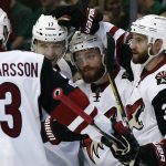Arizona Coyotes' Oliver Ekman-Larsson (23), Radim Vrbata (17), Max Domi (16) and Alex Goligoski (33) celebrate after Vrbata scored against the Dallas Stars during the first period of an NHL hockey game, Friday, Feb. 24, 2017, in Dallas. (AP Photo/Mike Stone)