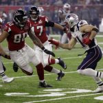 New England Patriots' Julian Edelman runs against Atlanta Falcons' Levine Toilolo on a punt return during the second half of the NFL Super Bowl 51 football game Sunday, Feb. 5, 2017, in Houston. (AP Photo/David J. Phillip)