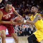 Arizona State guard Torian Graham and Stanford forward Trevor Stanback (33) battle for the ball during the first half of an NCAA college basketball game, Saturday, Feb. 11, 2017, in Tempe, Ariz. (AP Photo/Matt York)