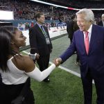 Olympic gold medalist Simone Biles shakes hands with New England Patriots owner Robert Kraft before the NFL Super Bowl 51 football game against the Atlanta Falcons Sunday, Feb. 5, 2017, in Houston. (AP Photo/David J. Phillip)