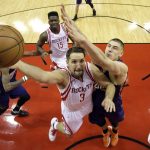 Houston Rockets' Ryan Anderson (3) goes up for a shot as Phoenix Suns' Alex Len defends during the second half of an NBA basketball game, Saturday, Feb. 11, 2017, in Houston. (AP Photo/David J. Phillip)