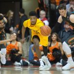 Arizona State's Andre Adams, center, beats the double team of Oregon State's Stephen Thompson Jr., left, and Matt Dahlen, right, during the second half of an NCAA college basketball game in Corvallis, Ore., Saturday, Feb. 4, 2017. Arizona State won 81-68. (AP Photo/Timothy J. Gonzalez)