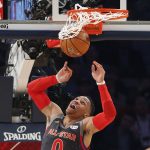 Western Conference guard Russell Westbrook of the Oklahoma City Thunder (0) makes a dunk during the first half of the NBA All-Star basketball game in New Orleans, Sunday, Feb. 19, 2017. (AP Photo/Gerald Herbert)