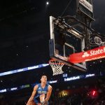 Orlando Magic's Aaron Gordon goes to slam dunk after a hovering drone, above, dropped the basketball as he participates in the slam dunk contest during NBA All-Star Saturday Night events in New Orleans, Saturday, Feb. 18, 2017. (AP Photo/Gerald Herbert)
