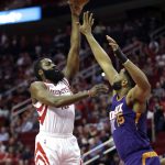 Houston Rockets' James Harden (13) shoots as Phoenix Suns' Alan Williams (15) defends during the first half of an NBA basketball game Saturday, Feb. 11, 2017, in Houston. (AP Photo/David J. Phillip)