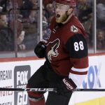 Arizona Coyotes left wing Jamie McGinn (88) reacts after scoring in the third period during an NHL hockey game against the Buffalo Sabres, Sunday, Feb. 26, 2017, in Glendale, Ariz. Arizona defeated Buffalo 3-2. (AP Photo/Rick Scuteri)