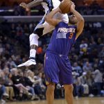 Memphis Grizzlies forward JaMychal Green, top, collides with Phoenix Suns forward Jared Dudley (3) in the first half of an NBA basketball game Wednesday, Feb. 8, 2017, in Memphis, Tenn. (AP Photo/Brandon Dill)