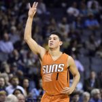 Phoenix Suns guard Devin Booker (1) reacts after scoring a 3-pointer in the first half of an NBA basketball game against the Memphis Grizzlies, Tuesday, Feb. 28, 2017, in Memphis, Tenn. (AP Photo/Brandon Dill)