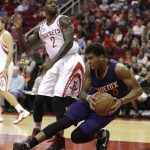 Phoenix Suns' Marquese Chriss (0) is fouled by Houston Rockets' Patrick Beverley (2) during the second half of an NBA basketball game Saturday, Feb. 11, 2017, in Houston. The Rockets won 133-102. (AP Photo/David J. Phillip)
