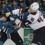 San Jose Sharks defenseman Brenden Dillon (4) fights Arizona Coyotes left wing Lawson Crouse (67) during the first period of an NHL hockey game in San Jose, Calif., Saturday, Feb. 4, 2017. (AP Photo/Jeff Chiu)
