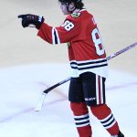 Chicago Blackhawks right wing Patrick Kane (88) reacts after scoring a goal against the Arizona Coyotes during the second period of an NHL hockey game Thursday, Feb. 23, 2017, in Chicago. (AP Photo/David Banks)