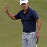Sung Kang acknowledges the crowd on the ninth green after making his birdie putt during the second round of the Phoenix Open golf tournament, Friday, Feb. 3, 2017, in Scottsdale, Ariz. (AP Photo/Matt York)