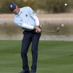 Matt Kucher hits his second shot from the 15th fairway during the second round of the Phoenix Open golf tournament, Friday, Feb. 3, 2017, in Scottsdale, Ariz. (AP Photo/Matt York)
