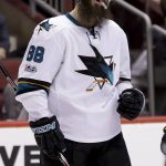 San Jose Sharks defenseman Brent Burns smiles after scoring his second goal during the third period of an NHL hockey game against the Arizona Coyotes in Glendale, Ariz., Saturday, Feb. 18, 2017. (AP Photo/Chris Carlson)