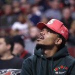 Chance Tthe Rapper takes in an NBA basketball game between the Chicago Bulls and the Phoenix Suns, during the first half Friday, Feb. 24, 2017, in Chicago. (AP Photo/Charles Rex Arbogast)