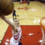 Houston Rockets' Sam Dekker goes up to dunk the ball against the Phoenix Suns during the second half of an NBA basketball game, Saturday, Feb. 11, 2017, in Houston. (AP Photo/David J. Phillip)