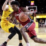 Stanford guard Marcus Allen (15) drives against Arizona State guard Kodi Justice (44) during the first half of an NCAA college basketball game, Saturday, Feb. 11, 2017, in Tempe, Ariz. (AP Photo/Matt York)