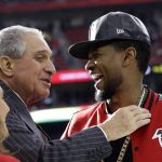 Atlanta Falcons owner Arthur Blank, left, talks to Usher before the NFL Super Bowl 51 football game between the Atlanta Falcons and the New England Patriots Sunday, Feb. 5, 2017, in Houston. (AP Photo/David J. Phillip)