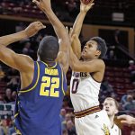 Arizona State guard Tra Holder (0) goes up for a shot against California center Kingsley Okoroh (22) during the second half of an NCAA college basketball game Wednesday, Feb. 8, 2017, in Tempe, Ariz. California defeated Arizona State 68-43. (AP Photo/Ross D. Franklin)