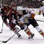 Anaheim Ducks right wing Ondrej Kase (86) shields the puck from Arizona Coyotes defenseman Connor Murphy (5) in the first period during an NHL hockey game, Monday, Feb. 20, 2017, in Glendale, Ariz. (AP Photo/Rick Scuteri)