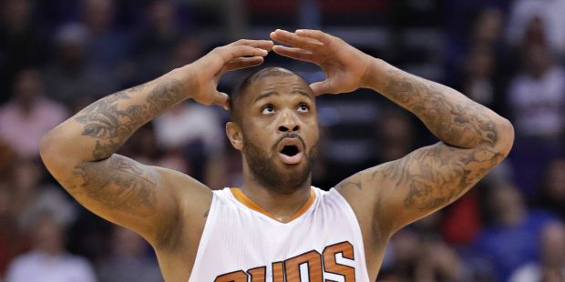 Phoenix Suns forward P.J. Tucker (17) reacts to a call during the second half of the team's NBA bas...