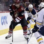Arizona Coyotes left wing Jordan Martinook (48) skates away from Buffalo Sabres center Zemgus Girgensons (28) in the second period during an NHL hockey game, Sunday, Feb. 26, 2017, in Glendale, Ariz. (AP Photo/Rick Scuteri)