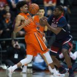 Oregon State's Stephen Thompson Jr., left, has the ball knocked away by Arizona's Kadeem Allen during the first half of an NCAA college basketball game in Corvallis, Ore., Thursday, Feb. 2, 2017. (AP Photo/Timothy J. Gonzalez)