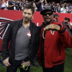 Harry Connick Jr., left, talks to Usher before the NFL Super Bowl 51 football game between the Atlanta Falcons and the New England Patriots Sunday, Feb. 5, 2017, in Houston. (AP Photo/Eric Gay)