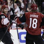 Arizona Coyotes left wing Brendan Perlini (29) celebrates with Christian Dvorak after scoring in the second period during an NHL hockey game against the Chicago Blackhawks, Thursday, Feb. 2, 2017, in Glendale, Ariz. (AP Photo/Rick Scuteri)
