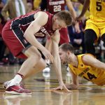 Stanford forward Michael Humphrey and Arizona State guard Kodi Justice (44) chase the loose ball during the first half of an NCAA college basketball game, Saturday, Feb. 11, 2017, in Tempe, Ariz. (AP Photo/Matt York)