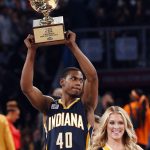 Indiana Pacers Glenn Robinson III holds up his trophy after winning the slam dunk contest during NBA All-Star Saturday Night events in New Orleans, Saturday, Feb. 18, 2017. (AP Photo/Gerald Herbert)