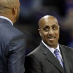 Washington coach Lorenzo Romar, right, greets a member of the Arizona State coaching staff before an NCAA college basketball game, Thursday, Feb. 16, 2017, in Seattle. (AP Photo/Ted S. Warren)