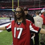 Rapper Lil Jon poses before the NFL Super Bowl 51 football game between the New England Patriots and the Atlanta Falcons, Sunday, Feb. 5, 2017, in Houston. (AP Photo/Chuck Burton)