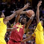 USC forward Chimezie Metu (4) is pressured by Arizona State forward Andre Adams (12) and guard Shannon Evans II during the first half of an NCAA college basketball game, Sunday, Feb. 26, 2017, in Tempe, Ariz. (AP Photo/Matt York)
