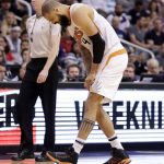 Phoenix Suns center Tyson Chandler (4) leaves the NBA basketball game against the Chicago Bulls after being injured, Friday, Feb. 10, 2017, in Phoenix. (AP Photo/Matt York)