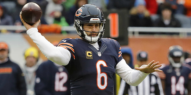 Chicago Bears quarterback Jay Cutler throws a pass against the Detroit Lions in an NFL football gam...