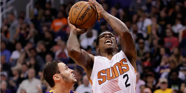 Phoenix Suns guard Eric Bledsoe (2) shoots over Los Angeles Lakers forward Larry Nance Jr. during t...