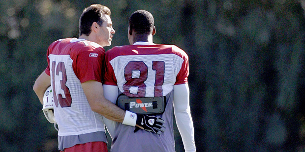 Arizona Cardinals wide receiver Anquan Boldin (81) and quarterback Kurt Warner (13) talk during foo...
