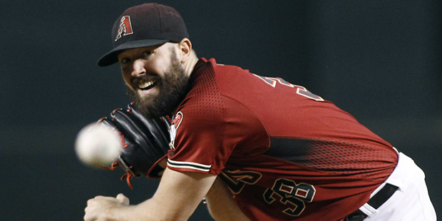 Arizona Diamondbacks' Robbie Ray throws a pitch against the Los Angeles Dodgers during the first in...