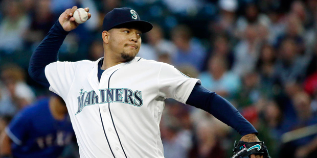 Seattle Mariners starting pitcher Taijuan Walker throws against the Texas Rangers during the first ...