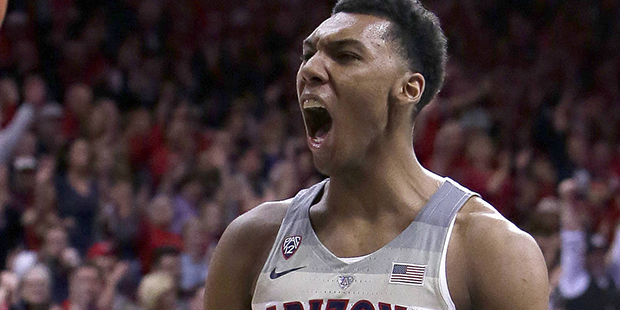 Arizona guard Allonzo Trier reacts after scoring against Southern California during the second half...