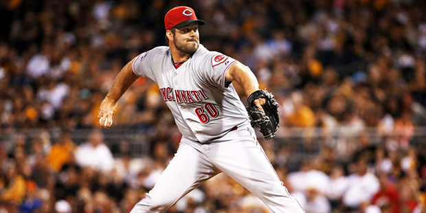Cincinnati Reds relief pitcher J.J. Hoover (60) delivers during a baseball game against the Pittsbu...