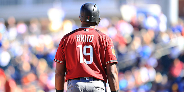 Arizona Diamondbacks outfielder Socrates Brito sits at third base in the sixth inning of the Diamon...