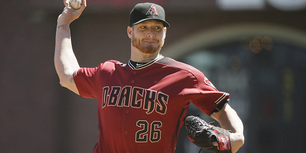 Arizona Diamondbacks starting pitcher Shelby Miller throws in the first inning of a baseball game a...